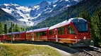 Transylvania Tour Collection | Romania Travel Tour Trips | Transylvania Tours - The Montebello curve near the Morteratsch station at the Bernina Pass; against the famous backdrop with Morteratsch glacier, Piz Palue and Piz Bernina.  Copyright by: Switzerl