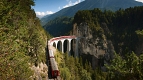 Transylvania Tour Collection | Romania Travel Tour Trips | Transylvania Tours - Train on the Landwasser viaduct between Alvaneu and Filisur.  Copyright by: Switzerland Tourism - BAFU  By-Line: swiss-image.ch / Renato Bagattini